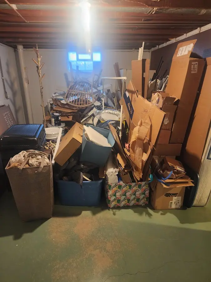 Roll-off dumpster container at job site for Yard Waste Dumpster Rental in Hearne